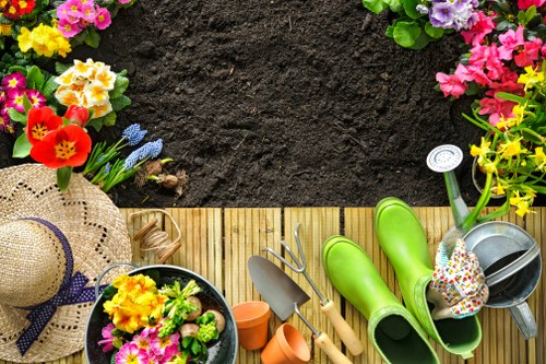 Seasonal garden maintenance in Harold Wood with planting beds and lawn